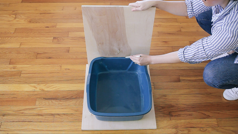 Marking height of litter pan on front piece