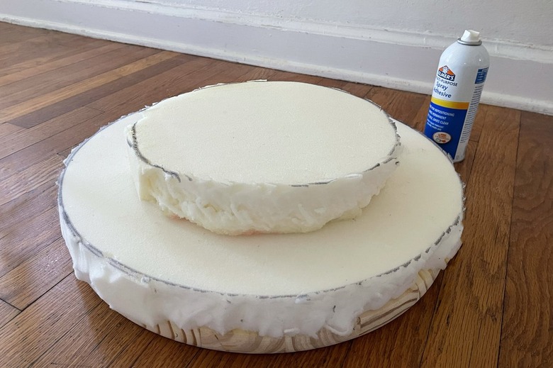 Foam circle glued on top of wood circle and smaller foam circle glued on top of that