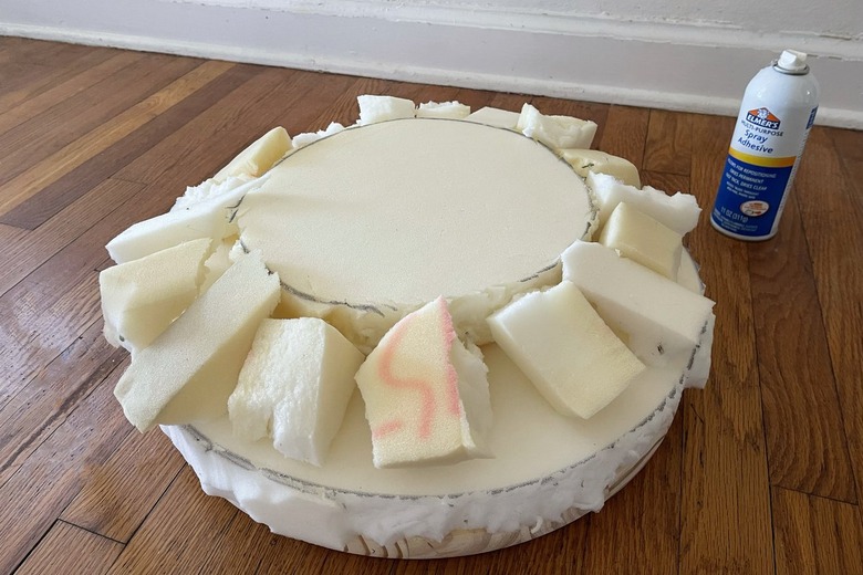 Small scrap pieces of foam glued around perimeter of foam circle to create mushroom shape