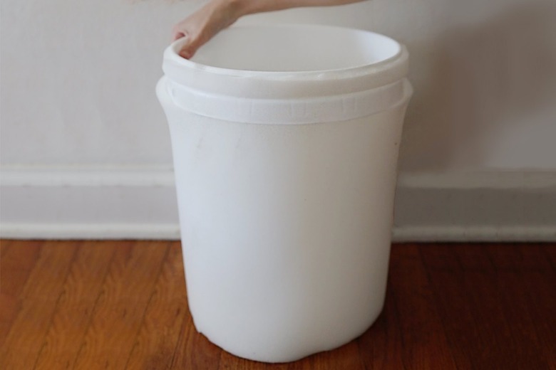 Gluing 1/2-inch foam to even out surface of bucket