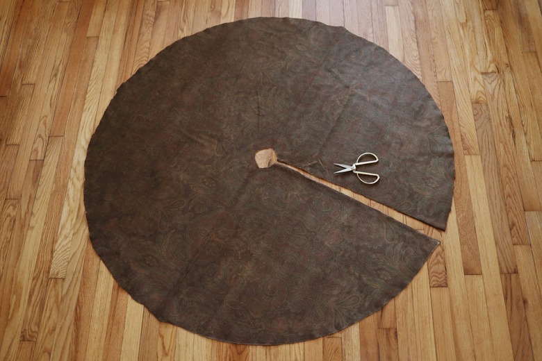 Brown velvet fabric cut into circle with slit cut into side