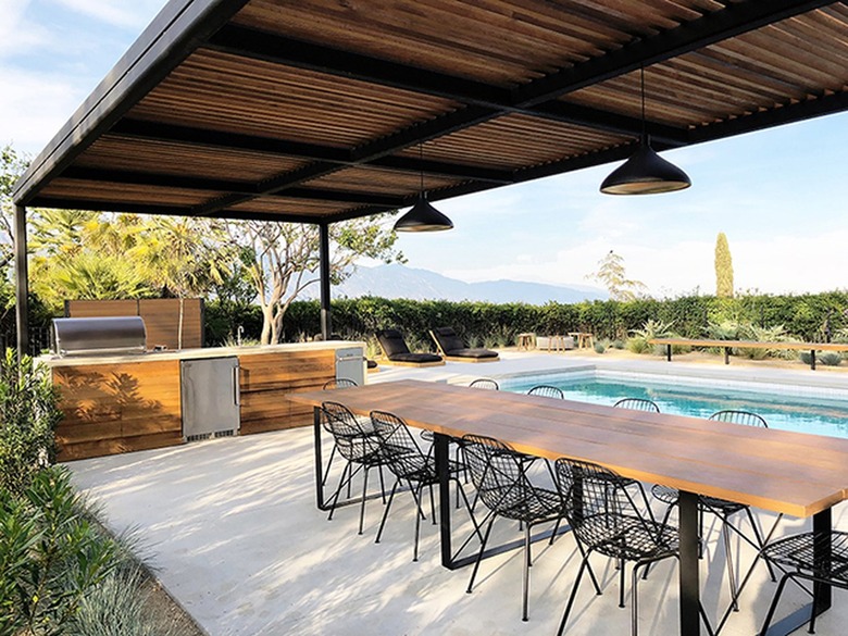 pool-side entertaining pergola with outdoor kitchen