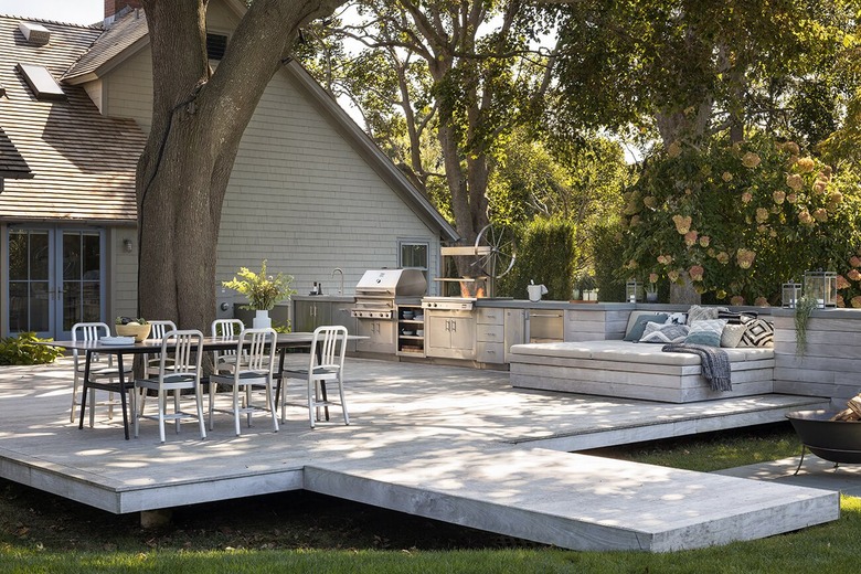 large outdoor patio with outdoor kitchen