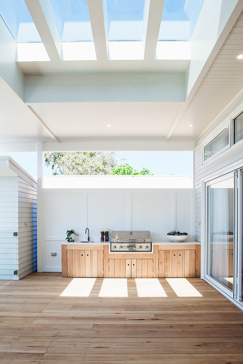 natural wood kitchen underneath veranda
