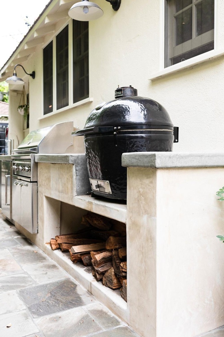 concrete outdoor kitchen with egg grill
