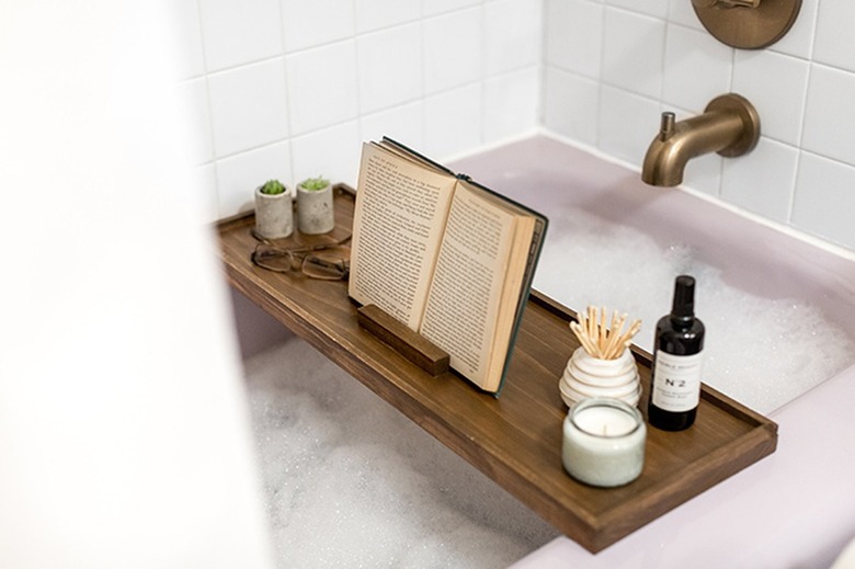 Wood bath tray with reading glasses