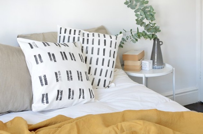 Mudcloth pillows on a bed