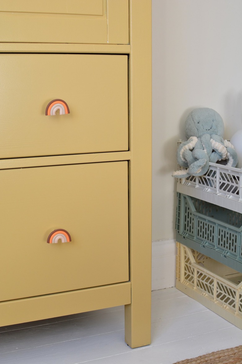 Rainbow door knobs on childs wardrobe