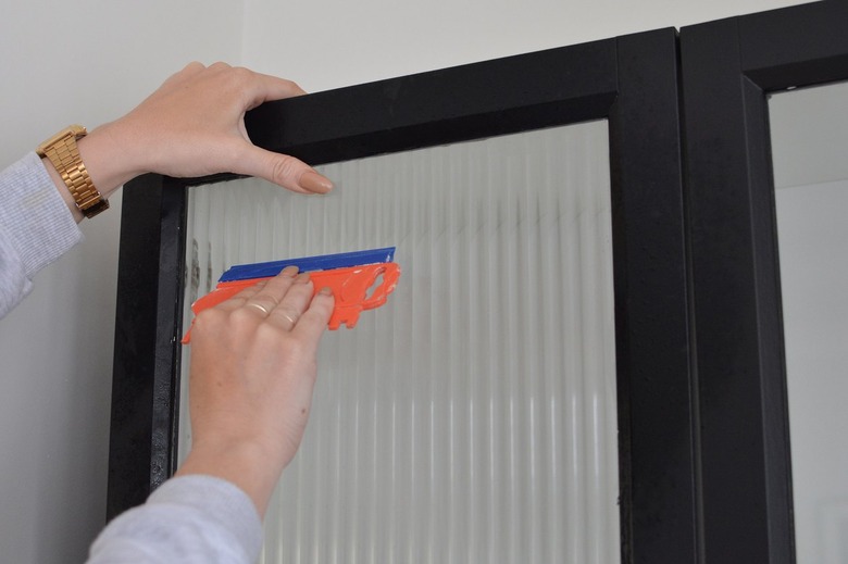 Squeegee blade window