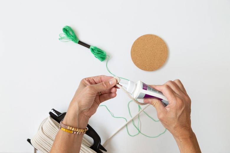 Add glue to rope coil for coasters