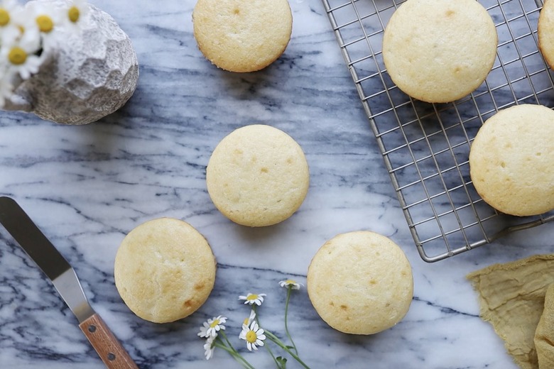 Un-frosted cupcakes on cooling rack
