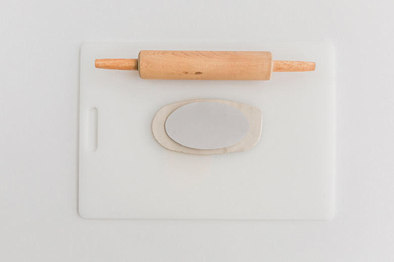 Lay the template on top of your rolled-out clay.