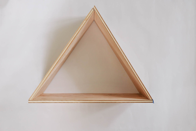 Wood board formed into triangle