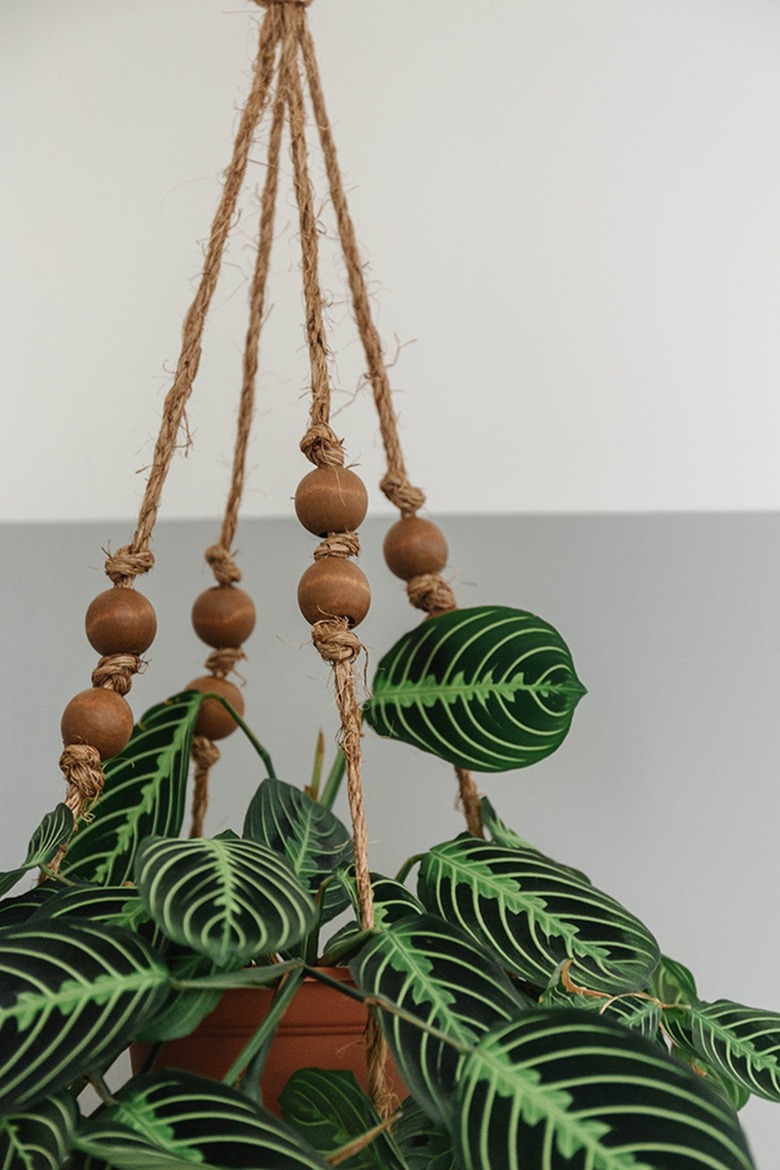 This boho hanging planter is made using a charger plate