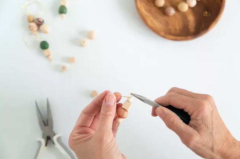 handing making clay wine charms