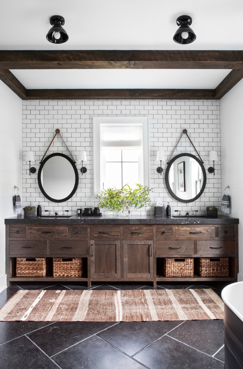 farmhouse-style bathroom with layered lighting