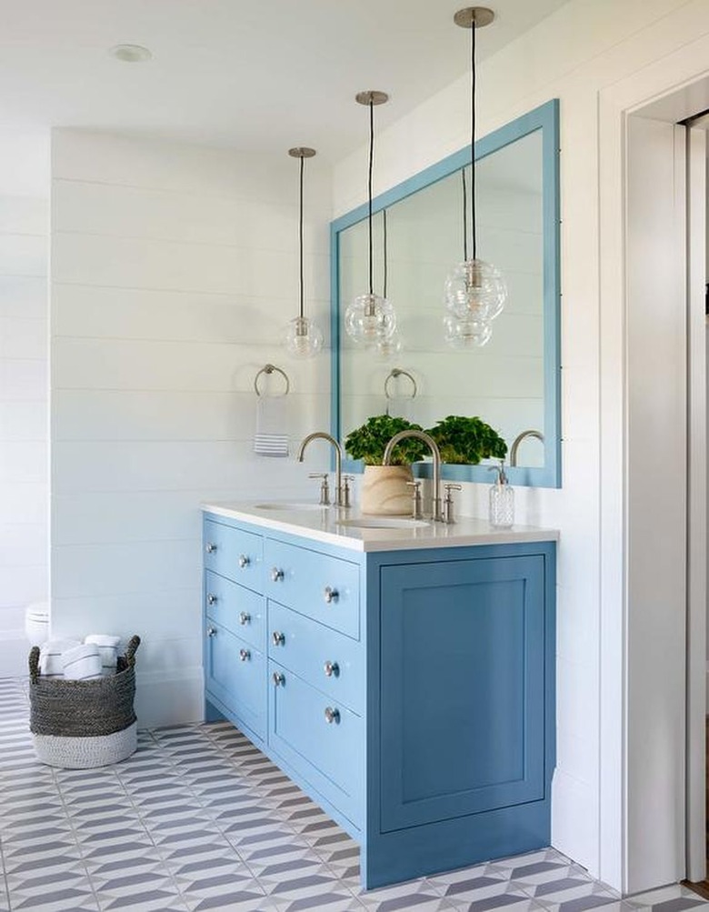 double blue vanity with coordinating mirror