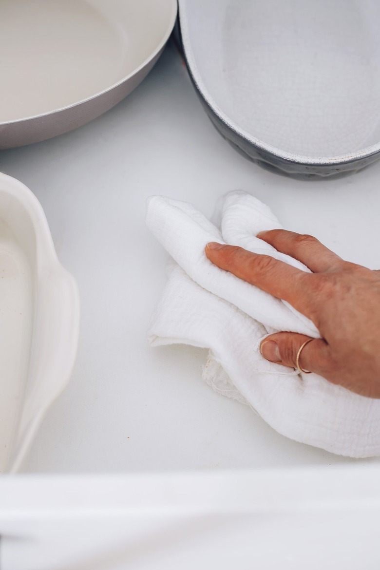 Clean crumbs from cabinets and drawers to avoid ants