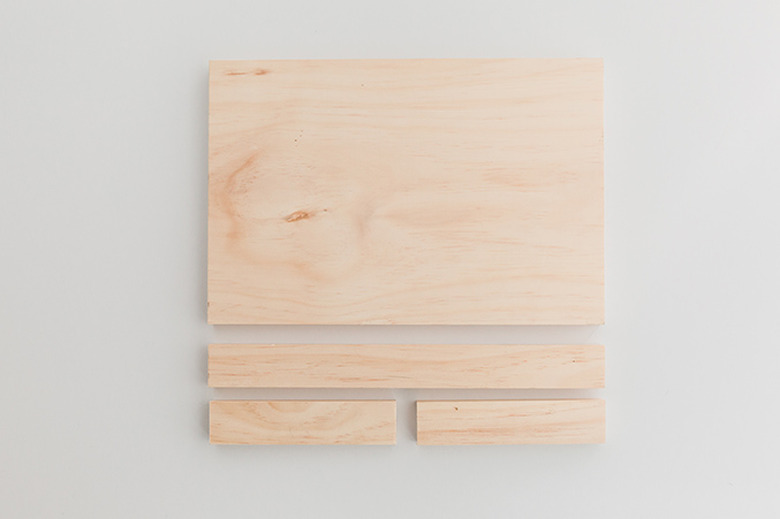 Cut the wood to size.