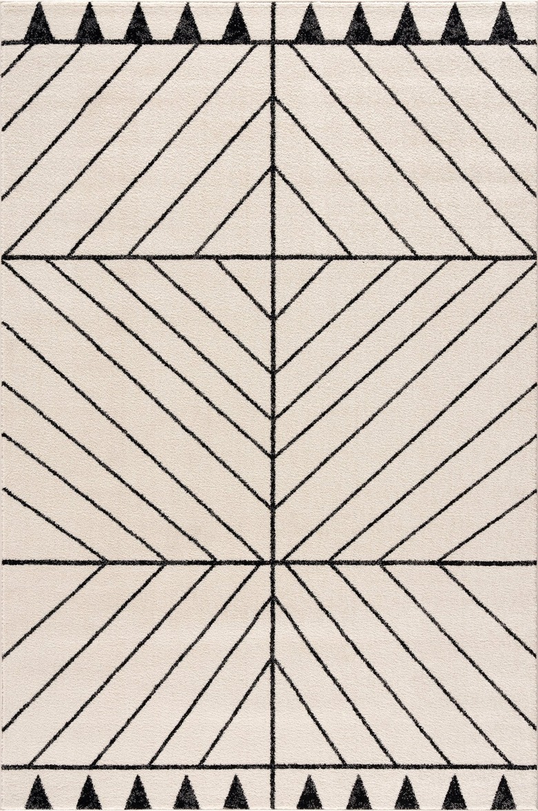 Black and white eco-friendly rug with line and triangle pattern