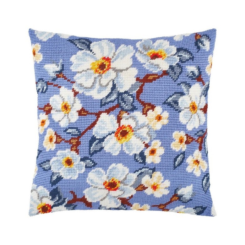 pillow with blue embroidered cover with floral pattern
