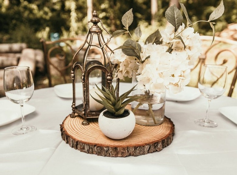 table with wood slice with decor