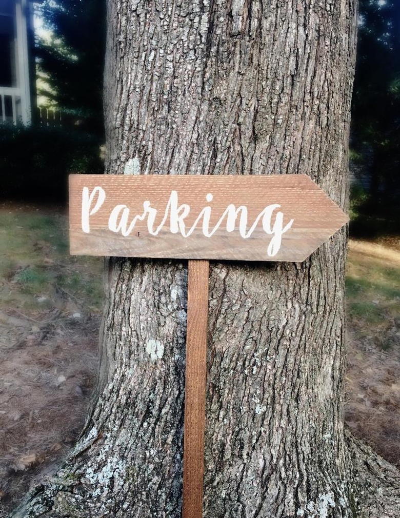 parking sign against tree