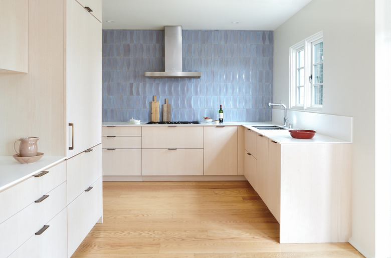 kitchen with blue tile backsplash
