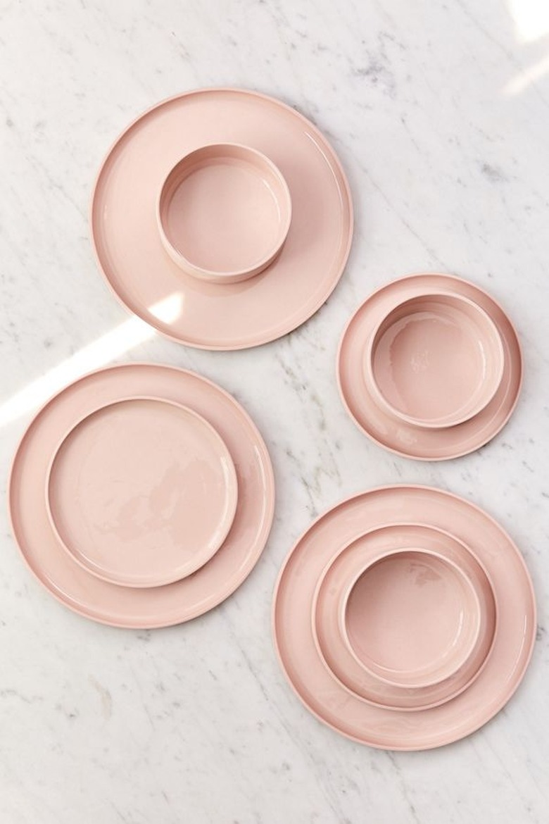 rose-colored dinnerware set with plates and bowls