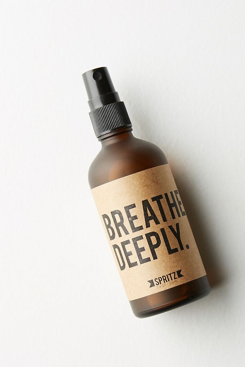 essential oil spray with label that read breathe deeply