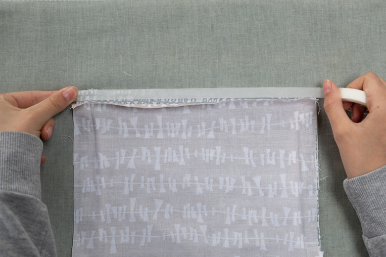 Easy No-Sew Face Mask Tutorial: folding fabric