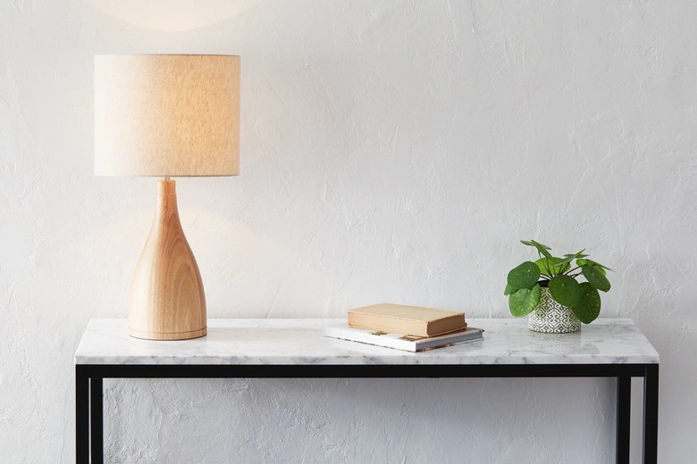Table lamp on marble consol