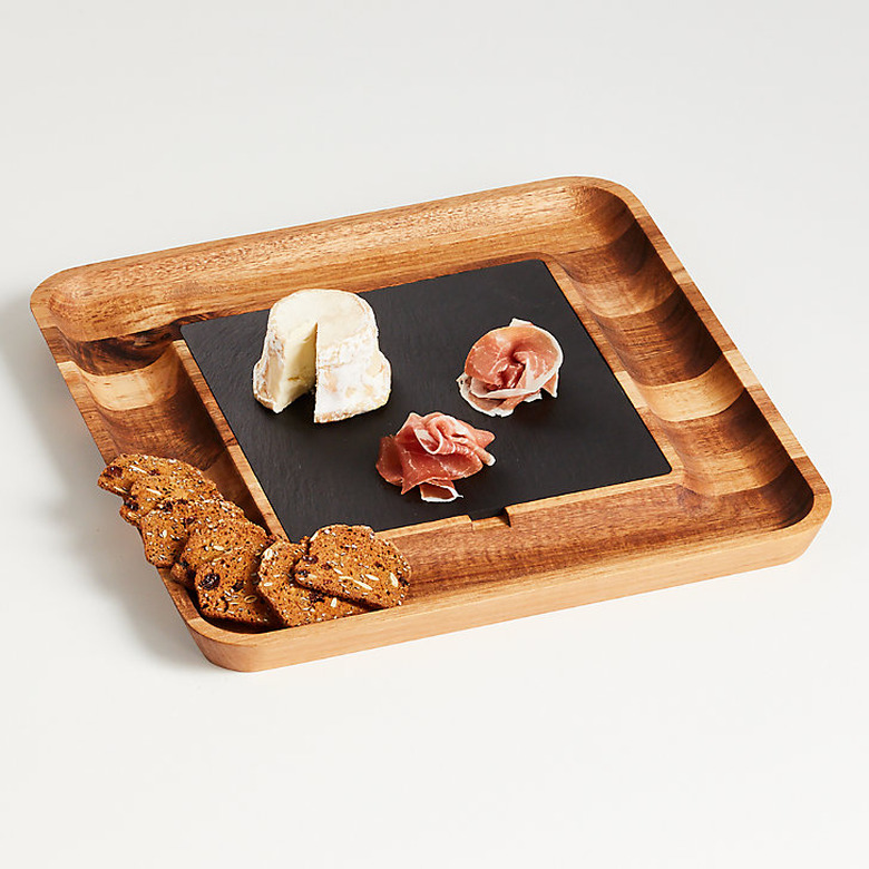 slate and wood board with crackers