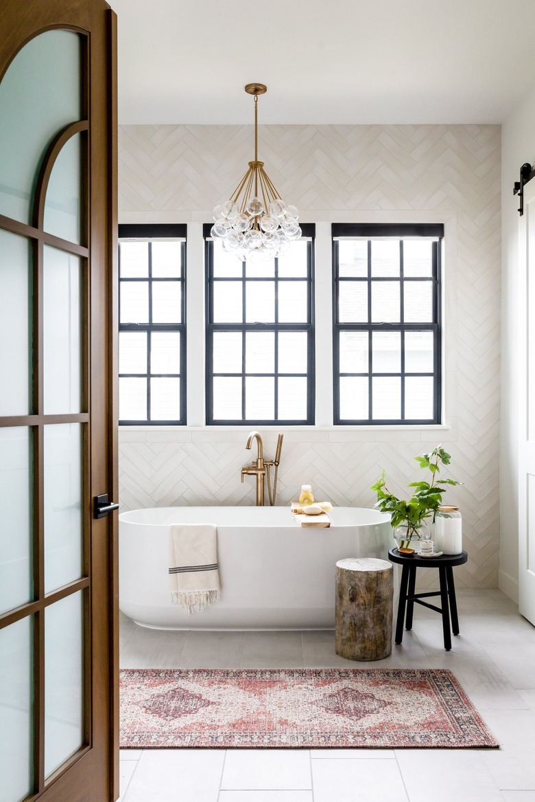 modern farmhouse bathroom idea with glam touches
