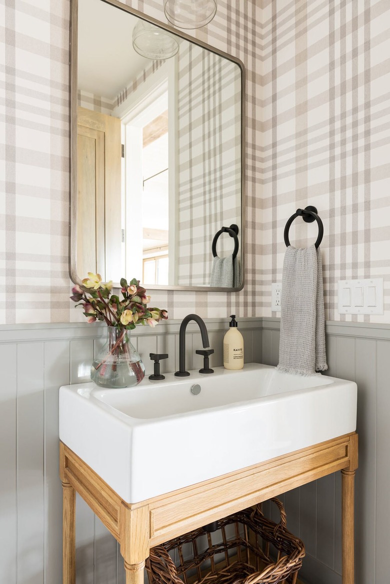beige and gray modern farmhouse bathroom idea with farmhouse sink and plaid wallpaper
