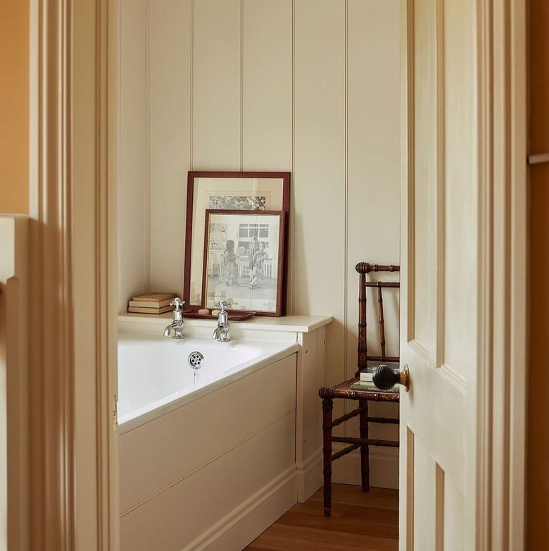 farmhouse bathroom idea shiplap paneling around the tub and on the walls