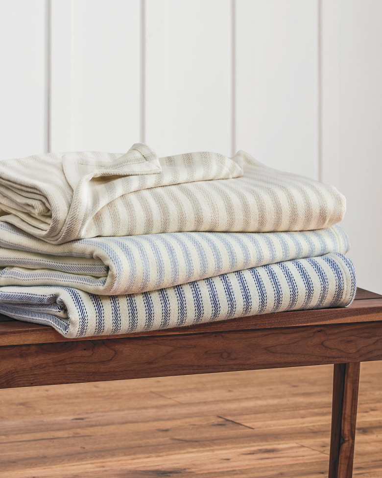farmhouse bedding idea with ticking stripe blankets from Pendleton