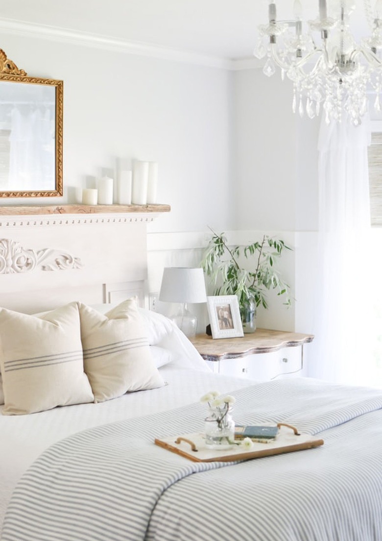 Farmhouse Chic Bedroom Ideas in Bedroom with chandelier