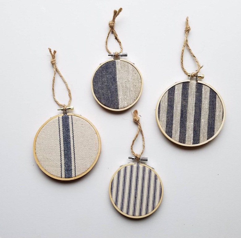 Feed sack style farmhouse Christmas decor with ornaments in blue