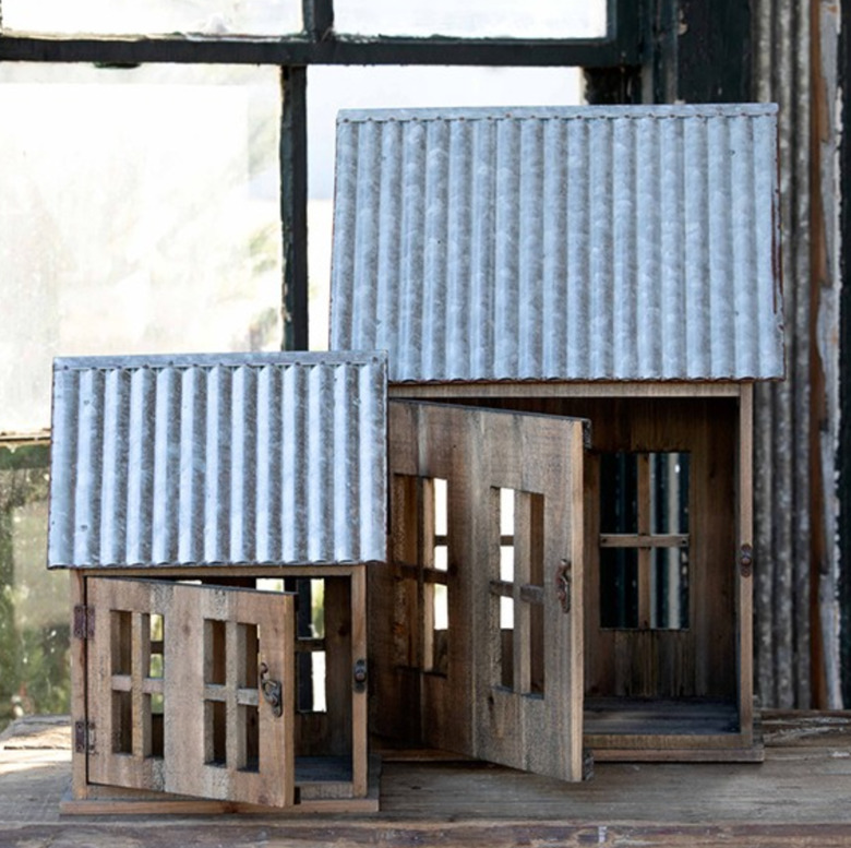 farmhouse Christmas decor with house lanterns with galvanized metal roofs and reclaimed wood