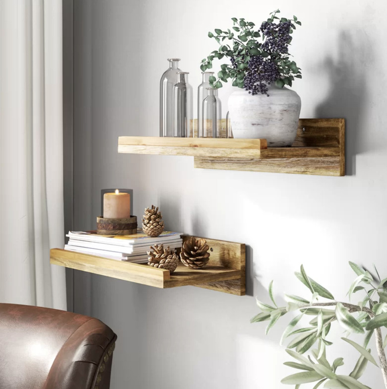 Wayfair farmhouse decor with wood floating shelves on the wall