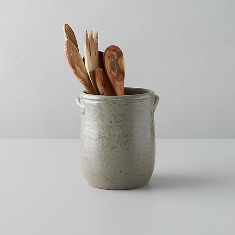 Terrain farmhouse decor with ceramic cooking utensil holder and wooden serving spoons
