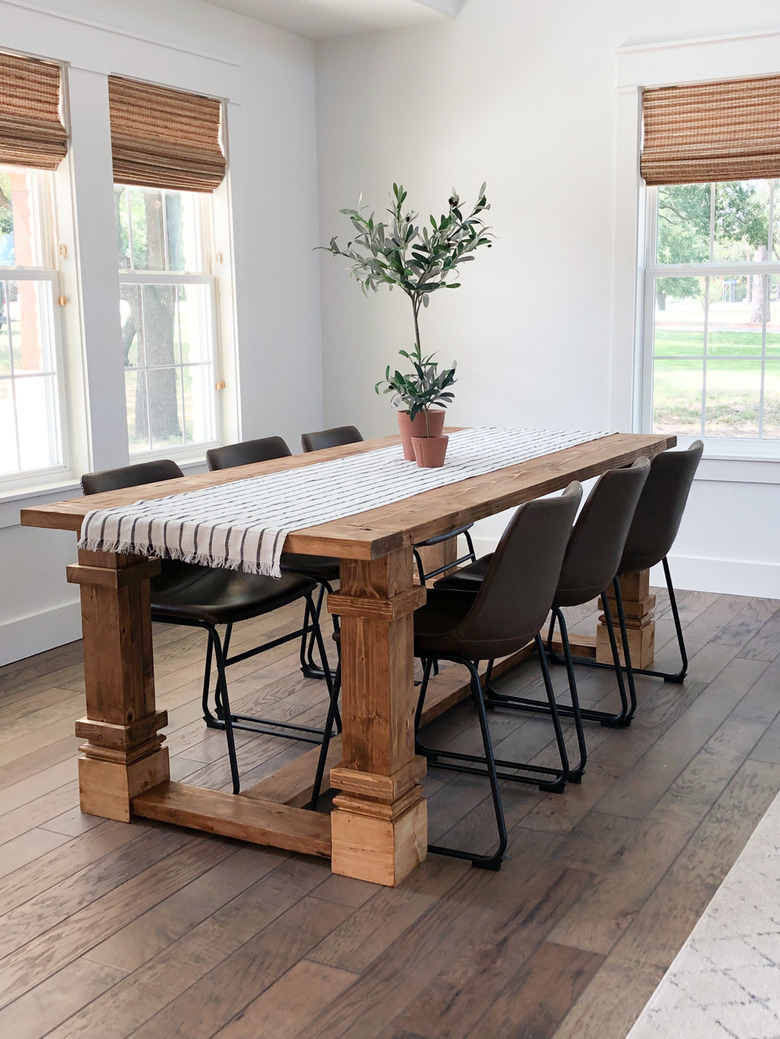 modern farmhouse DIY idea wood dining table with black chairs and table runner