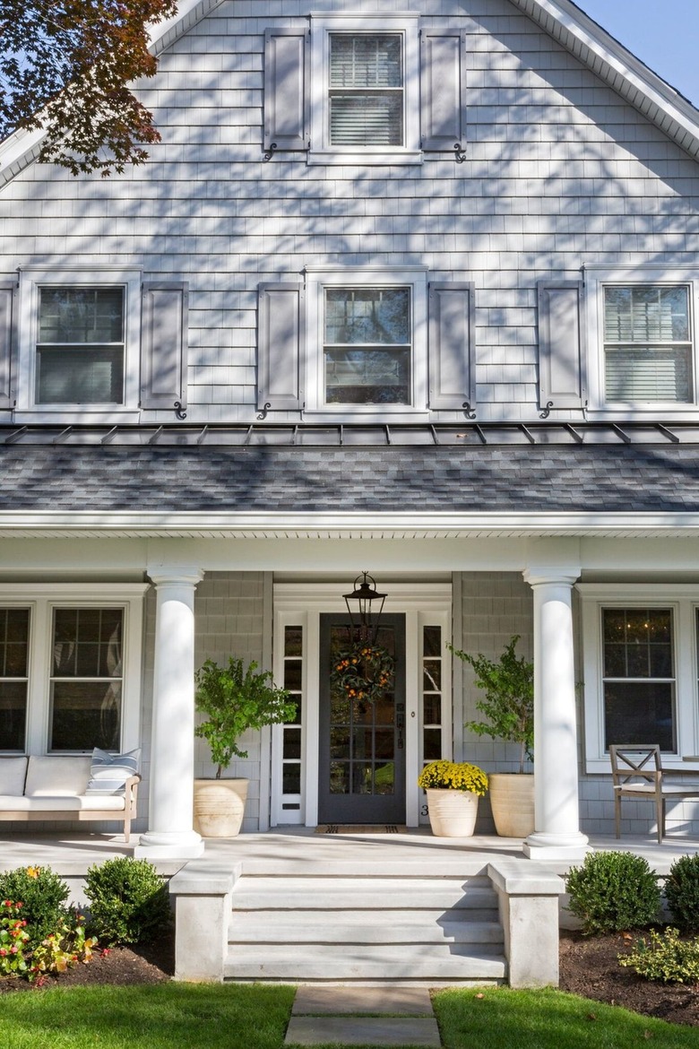 Gray farmhouse with white trim