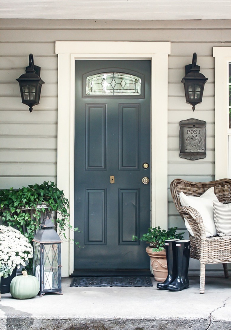 farmhouse style front porch with neutral door