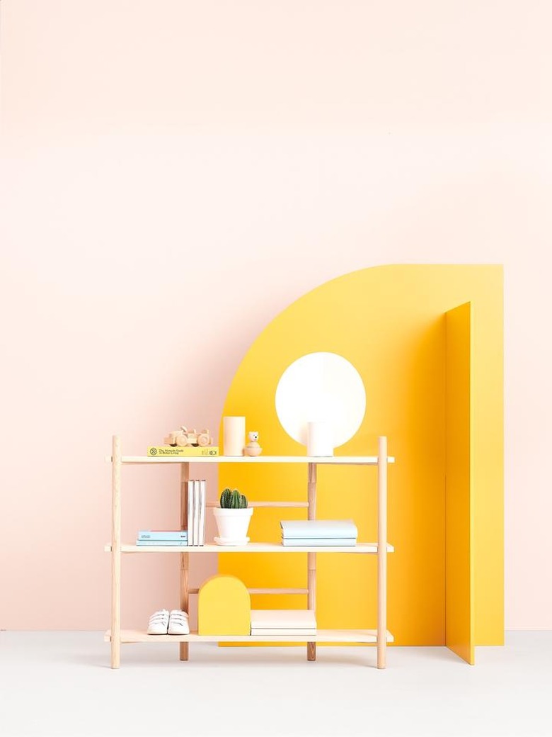 shelving system near yellow room divider