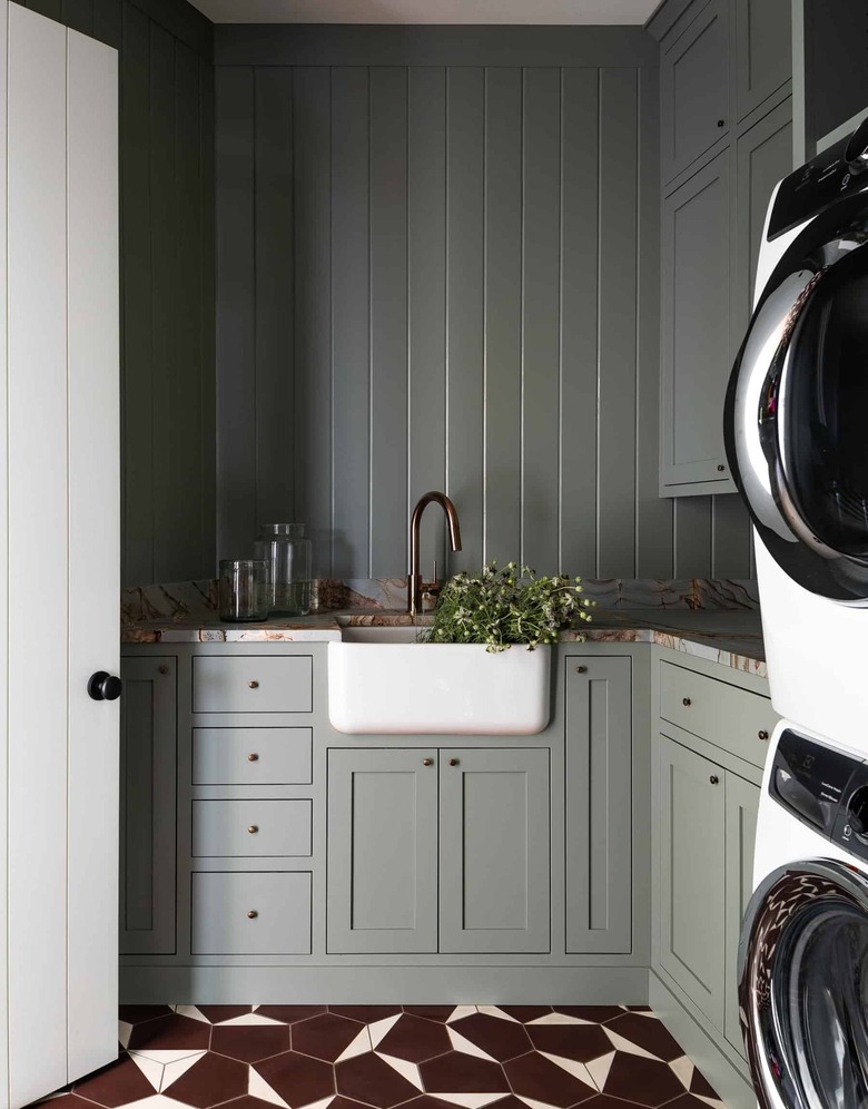 maroon and white tile in gray laundry room