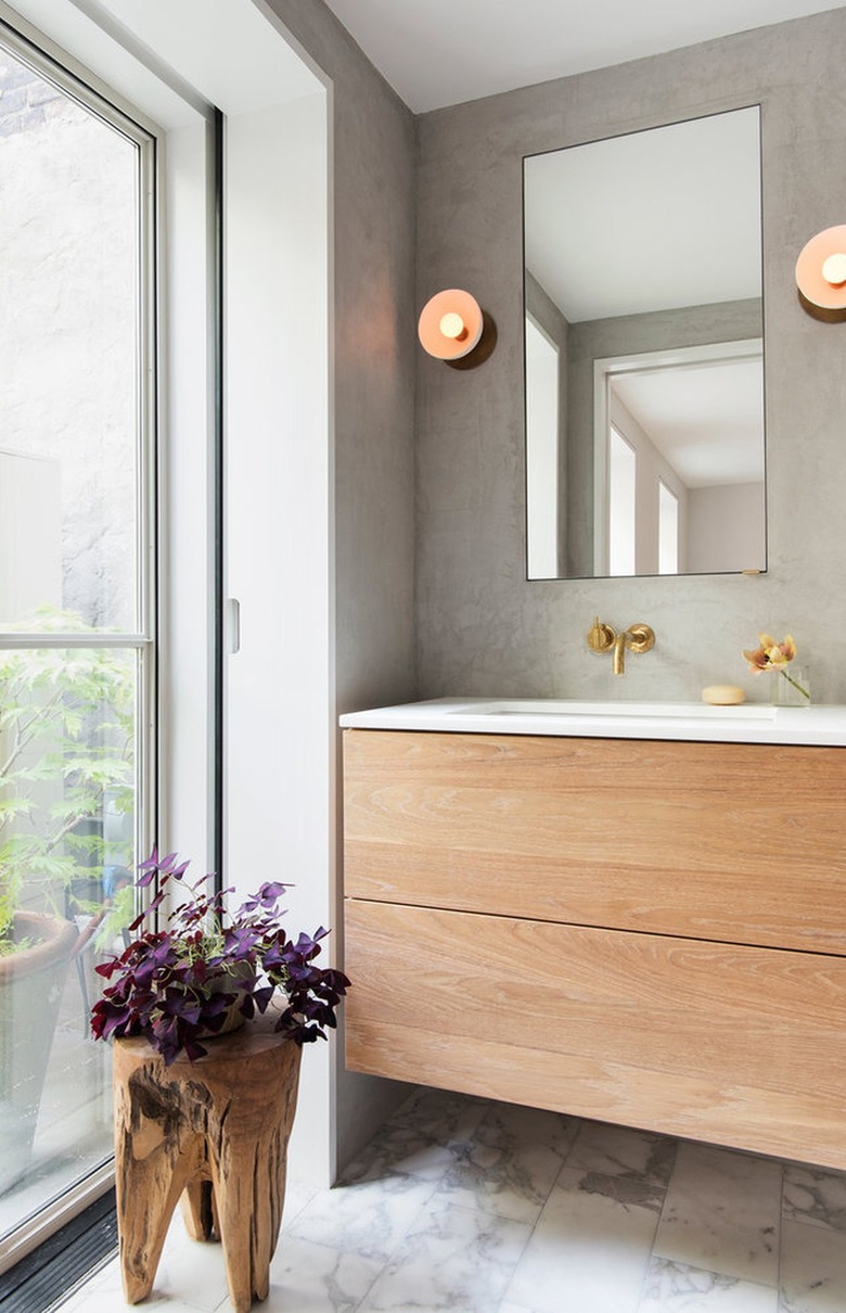 gray bathroom with white and gray marble floor tile