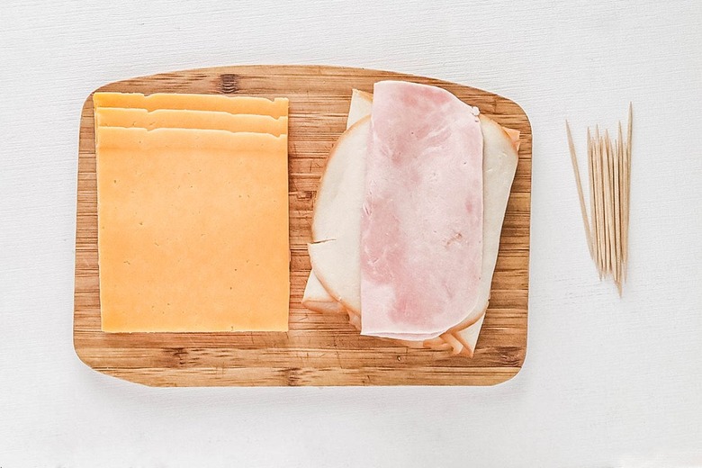 Ingredients for rolled meat and cheese roses