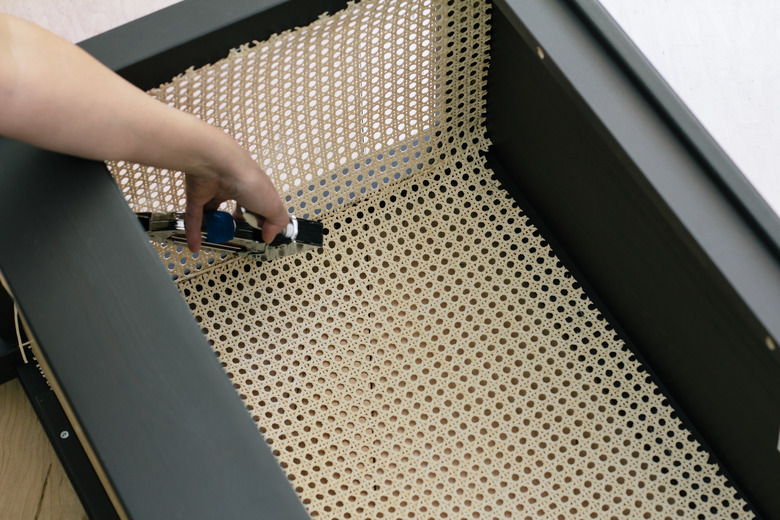 Stapling cane webbing to IKEA console table